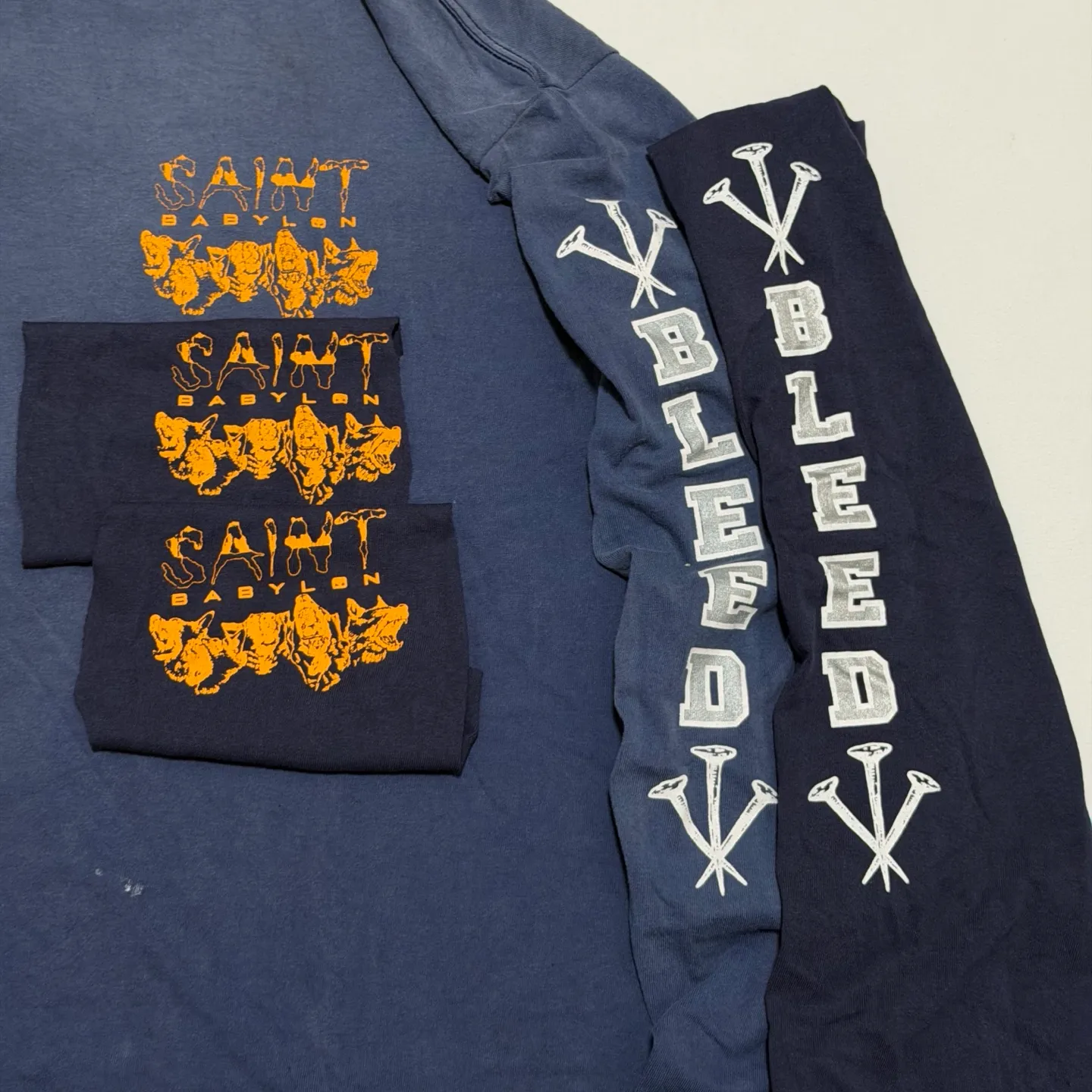 SAINT Mxxxxxx × BABYLON BBLN_LS TEE/SAINT BABYLON/NVY/BABYLON co-branded style Wolf head SAINT/nail distressed long sleeves Washed blue S-XL Completely matched Tube weaving fabric without side seams Garment dyeing Maliu water faded distressing Simulated sun fading treatment Natural fading Handmade holes and frayed Ink splashing treatment Correct main mark/wash mark/little angel anti-counterfeiting mark